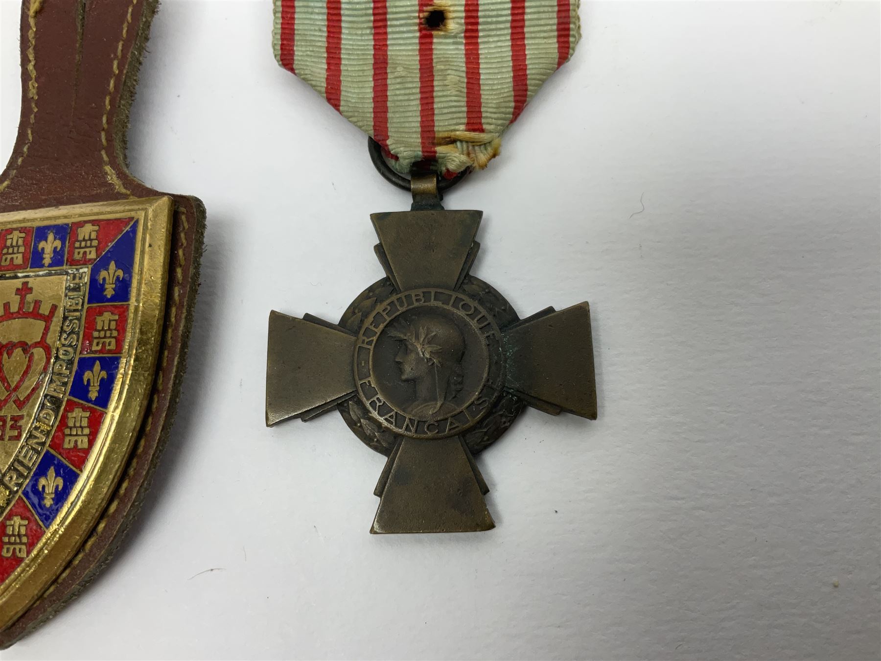 Five WW1 French medals comprising Medaille Militaire Gallantry Award, two Croix de Combattant, Medaille Commemorative Francais 1914-18 and a Patriotic Medal; together with small quantity of Russian badges etc