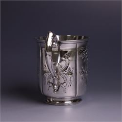 Victorian silver christerning mug, of cylindrical form with four panels of embossed floral decoration, hallmarked H J Lias & Son, London 1876, H10cm