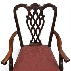Chippendale design set of ten (8+2) mahogany dining chairs, serpentine cresting rails with carved detail over pierced ribbon-tied splats, red damask upholstered drop-in seats, on cabriole supports with acanthus carved knees and claw and ball feet