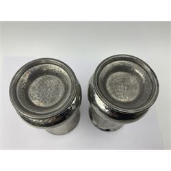 Pair of Liberty & Co Tudric pewter vases, each of bellied form with hammered finish, upon a circular spreading foot, impressed beneath 0987, H12cm