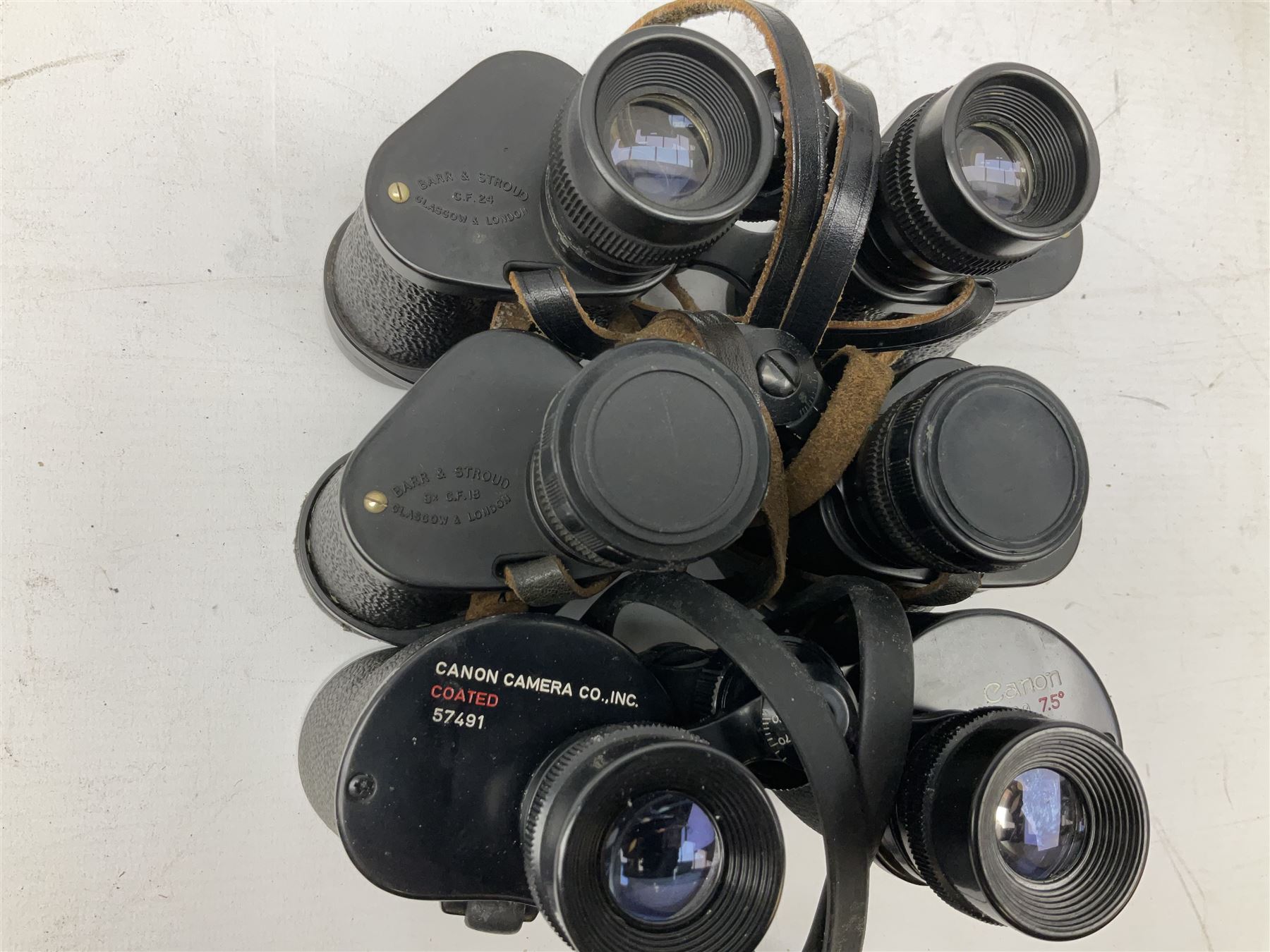 Ten cased pairs of binoculars, to include Rainbow 20x60, Barr & Stroud 7x, Yashica 7x50, Ross London Stepmur 10x50, Wray London Defiant 10x35, Canon 8x30 etc