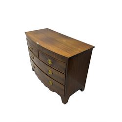 19th century walnut and mahogany bow front chest, fitted with two short and two long drawers with cockbeading and figured fronts, shaped apron with tapered supports
