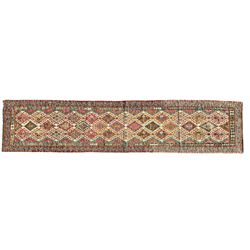 Anatolian Turkish Kilim multi-colour runner rug, decorated with all over geometric lozenges with ivory outline, the banded border with repeating trailing patterns