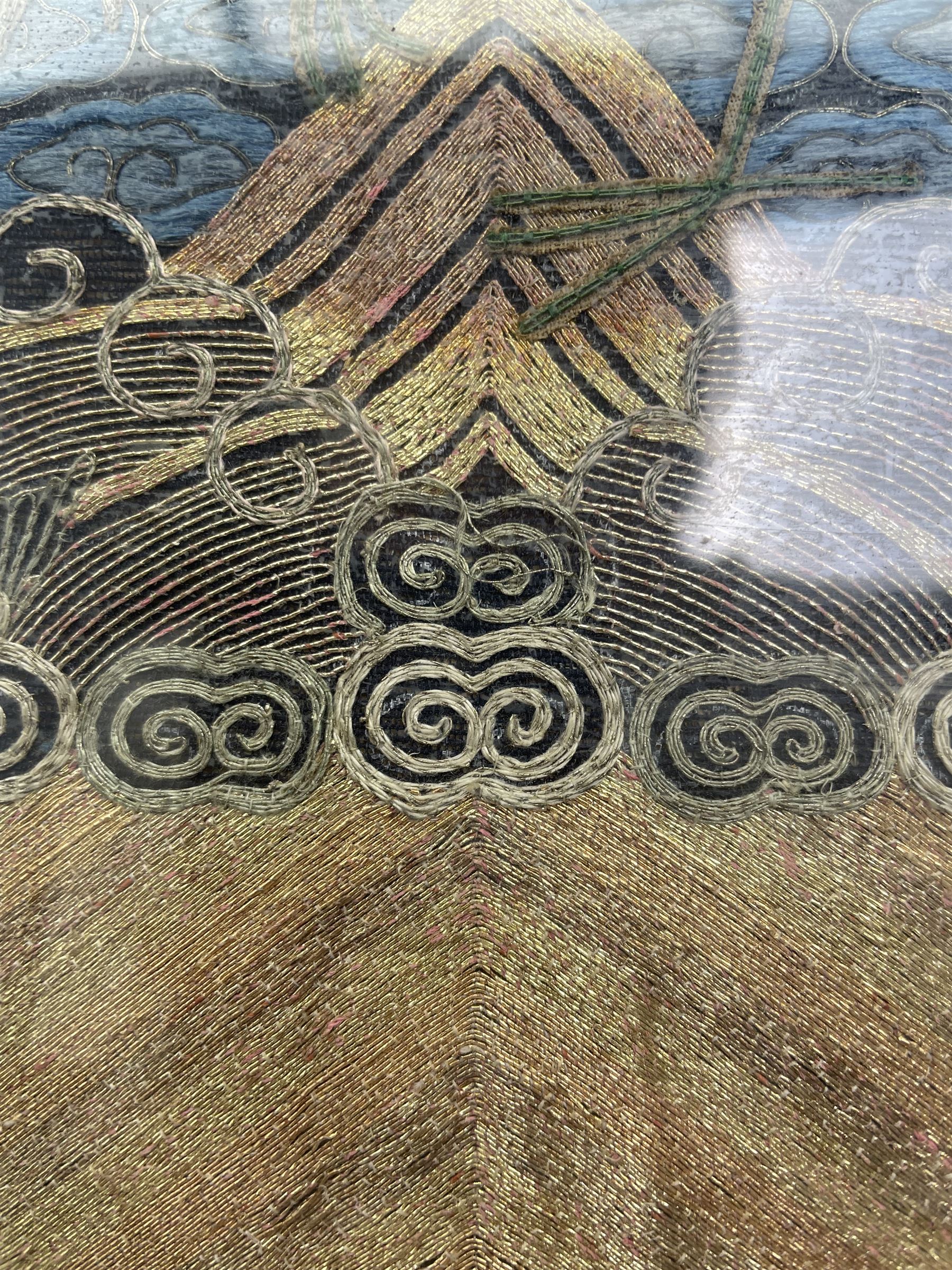 Early 20th century Chinese silk work tapestry, depicting a crane flying over a river, H30cm 