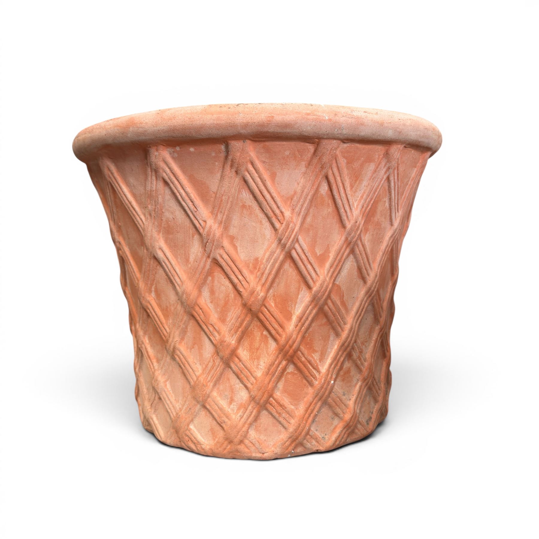 Three terracotta planters with lattice relief and rolled rim