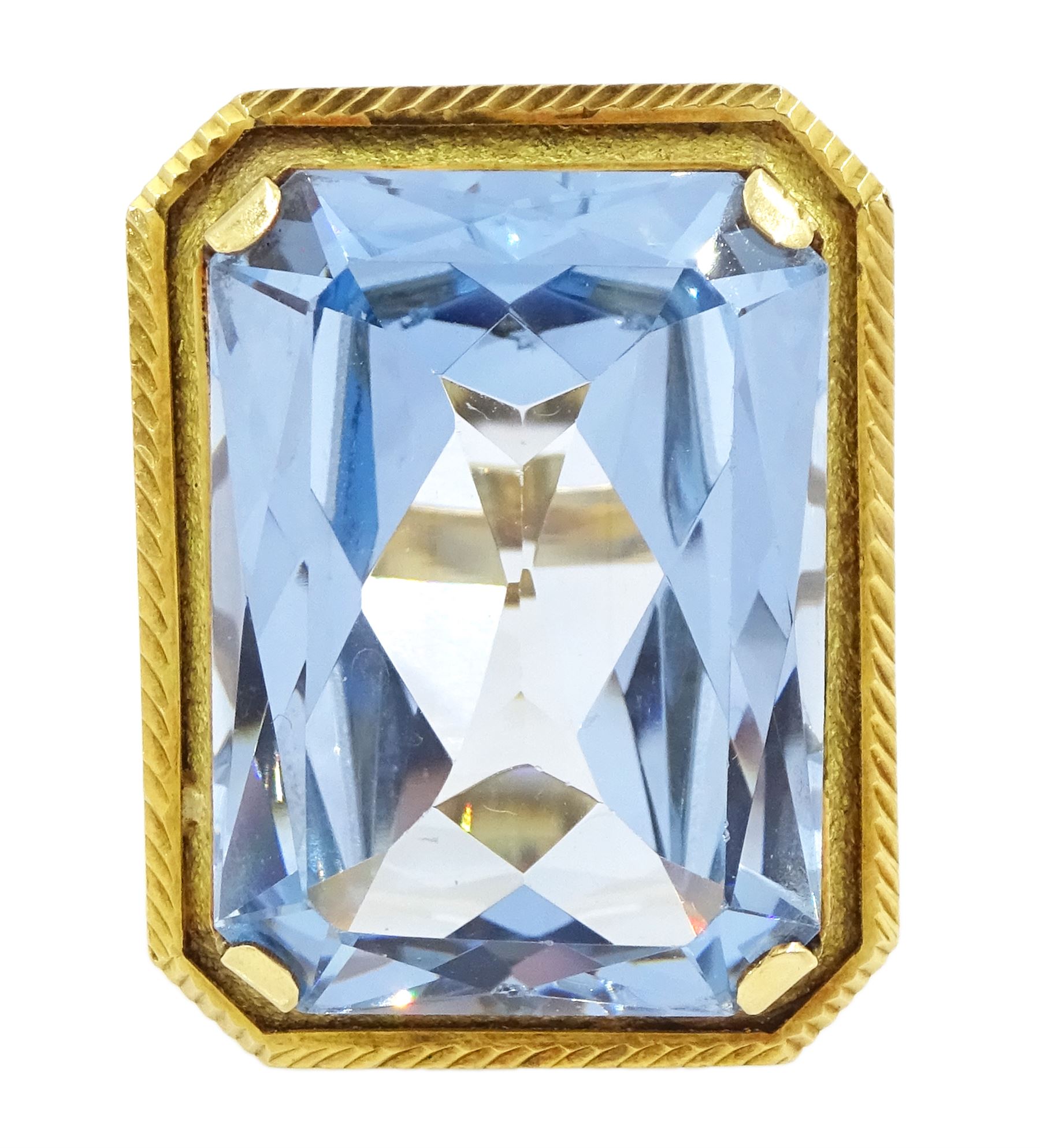 Gold synthetic spinel ring, single octagonal cut synthetic spinel with textured and engraved border