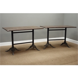  Two rectangular pub/bistro tables on cast metal base, 108cm x 61cm, H71cm  