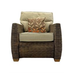 Contemporary two seat rattan conservatory sofa with loose cushions, and pair of matching armchairs, with upholstered seat and back cushions in a beige fabric, curved arms and front complete with scatter cushions 

Chairs (H 92cm, W 75cm, D 84cm)
Sofa (H 92cm, W 130cm, D 84cm)
