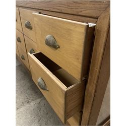 20th century oak and glazed haberdashery shop's display cabinet, fitted with twelve slides, on skirted base - THIS LOT IS TO BE COLLECTED BY APPOINTMENT FROM THE OLD BUFFER DEPOT, MELBOURNE PLACE, SOWERBY, THIRSK, YO7 1QY