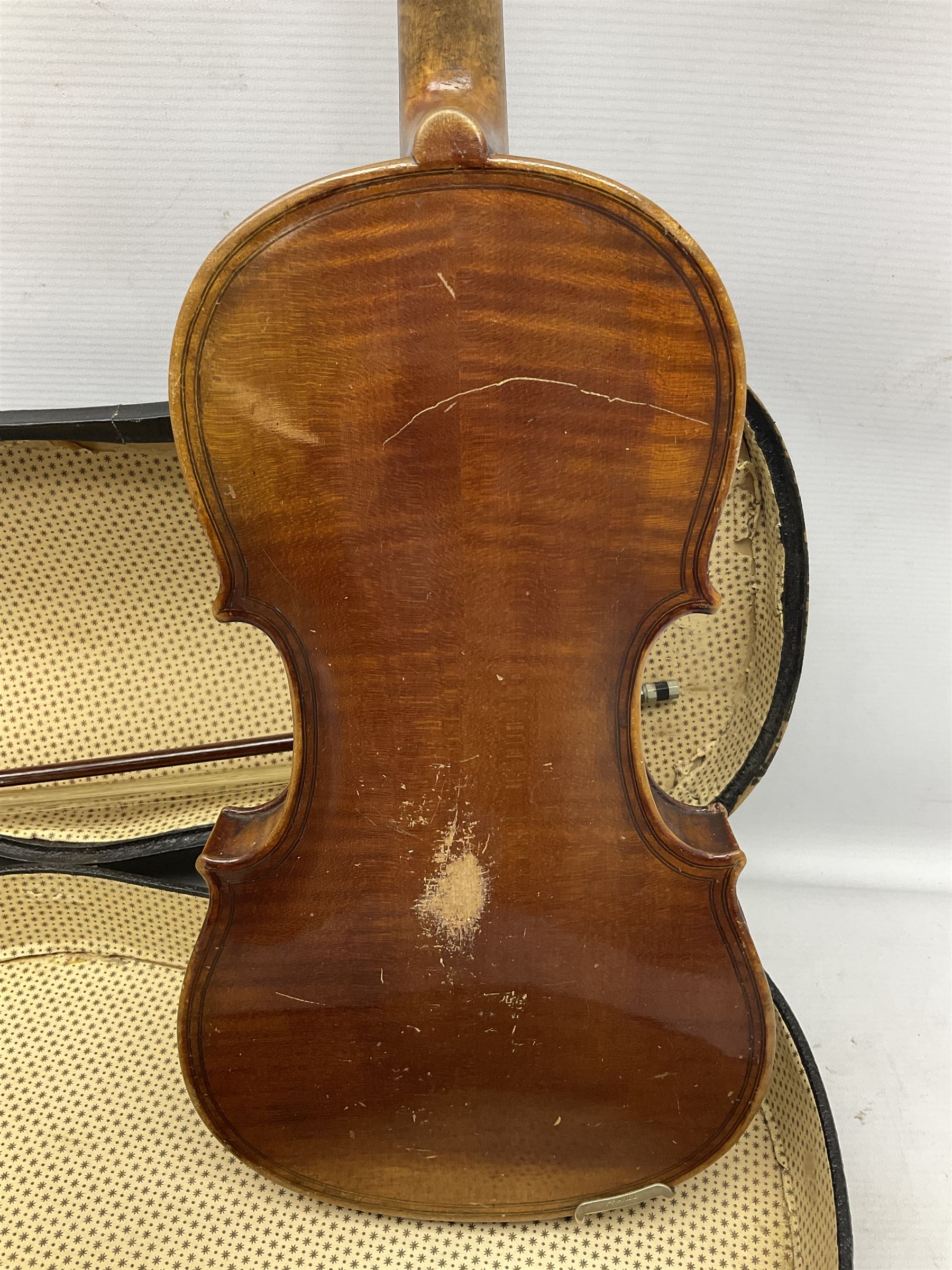 German copy of a Maggini violin c1900 with 35.5cm two-piece maple back and ribs and spruce top, bears label 'Maggini Deutsche Arbeit 1866' L59cm; in carrying case with bow