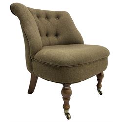 Victorian design tub shaped bedroom chair, upholstered in back-buttoned tweed fabric, on turned front supports with castors