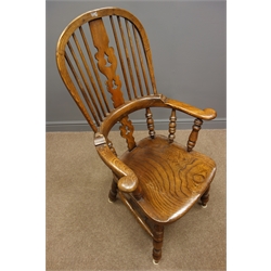  19th century elm and ash double bow Windsor armchair, pierced splat, four turned supports and double 'H' stretchers, W50cm, H115cm, D53cm  