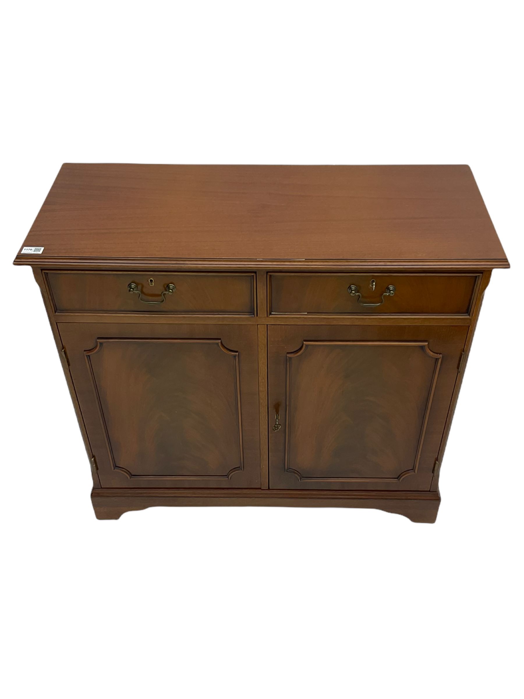 Reproduction mahogany side cabinet, moulded rectangular top over two drawers and double cupboard, bracket feet