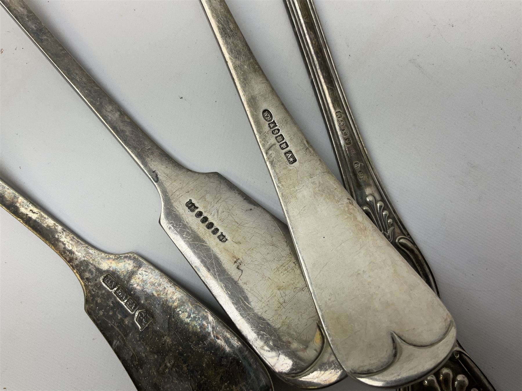 Two silver plated Fiddle pattern soup ladles, a silver plated Old English pattern soup ladle, and a silver plated Kings pattern basting spoon, (4)