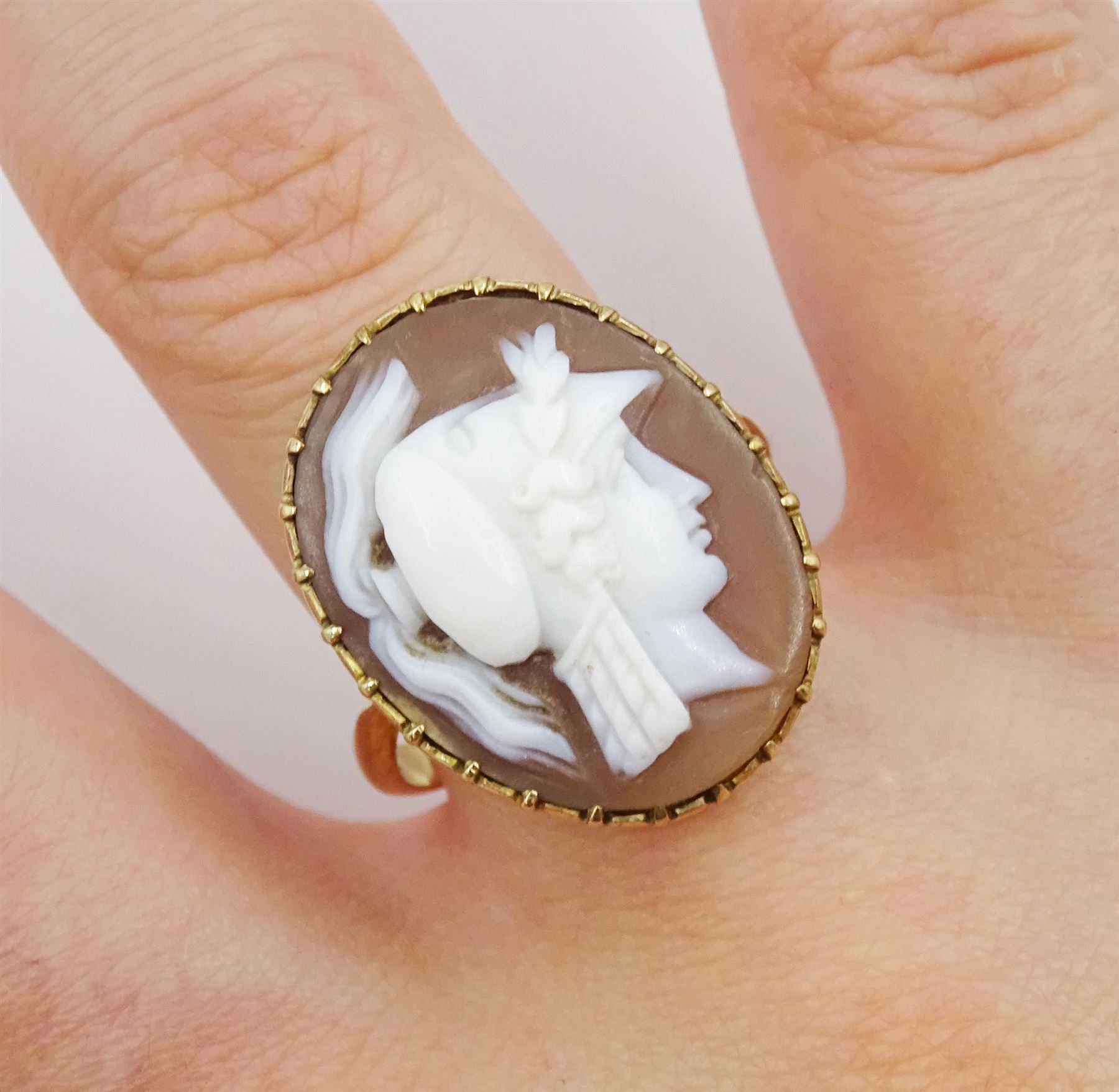 Victorian gold cameo ring depicting the goddess Minerva, stamped 9ct 