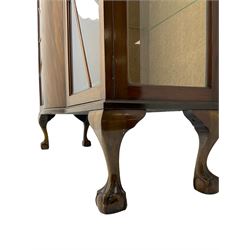 Mid-20th century Art Deco style walnut display cabinet, two central drawers over cupboard flanked by two bevel glazed display cabinets with sunburst astragal glazing, on ball and claw cabriole feet