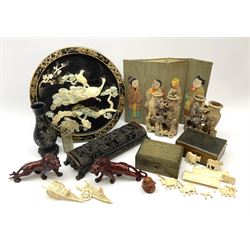 A group of assorted Oriental collectables, to include pair of carved soapstone bud vases, papier mache plaque of circular form decorated with phoenix and blossoming branches in mother of pearl, D30cm, a composite box, the pierced cover decorated with dragons, L27cm, Chinese brass box, etc. 