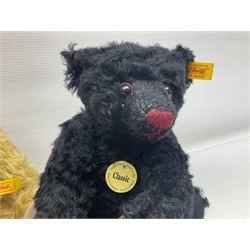 Seven modern Steiff teddy bears comprising two limited edition '1908 Paul the Growler' bears Nos.1124/3000 and 1310/3000; 028649 Classic Teddybear 23; 005992 Classic Teddybear 28 (black); 071249 Mungo Meerkat 30; 079139 Reclining dog for American Kennel Club; and 029561 Petsy gespitzt (1928) 16cm; together with a Mrs. McCatty's limited edition 2156 Sophie bear No.1557/1750; all unboxed but most with labels (8)