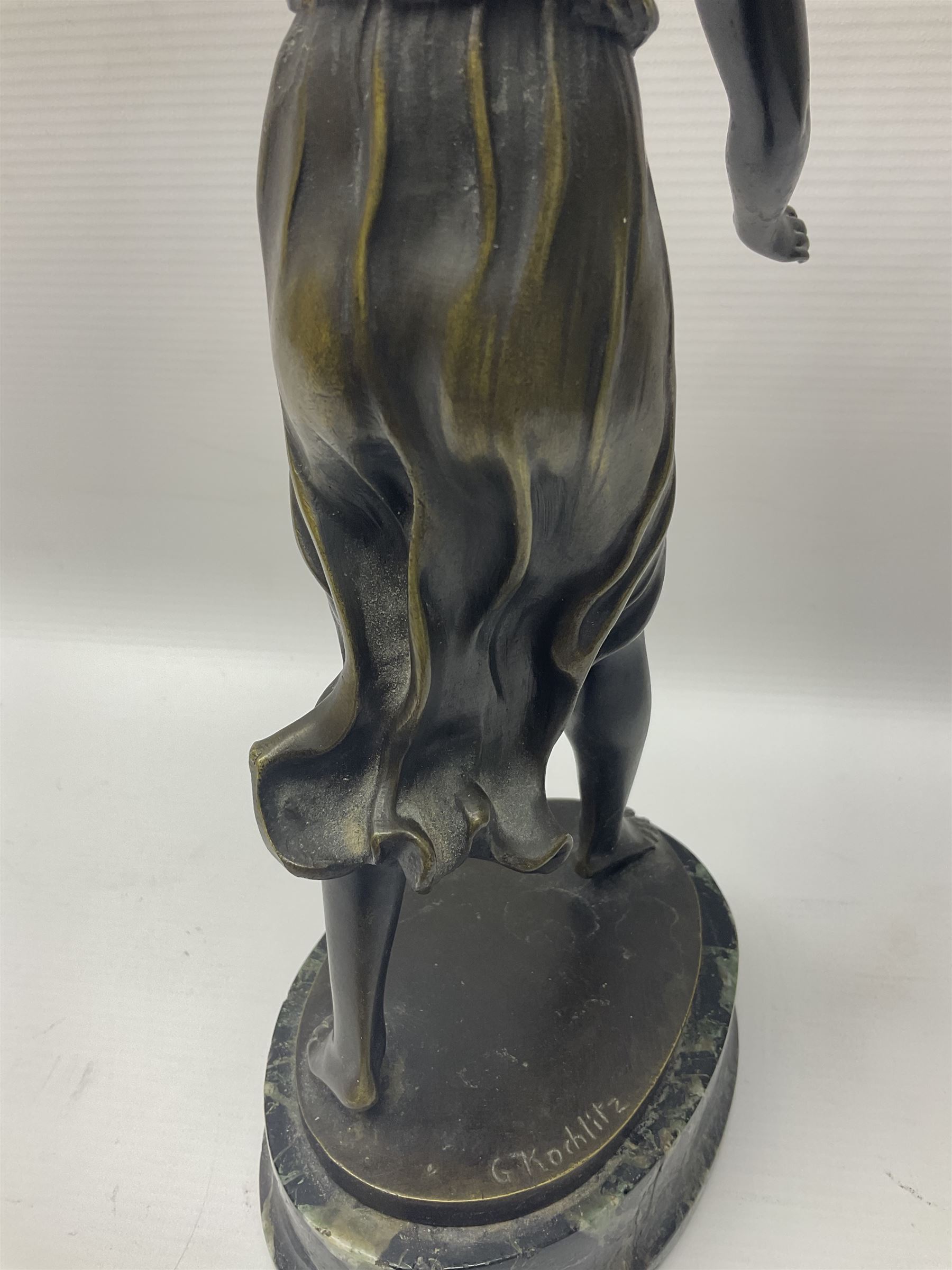 After C. Rochlitz, bronze, modelled as a semi nude female figure, upon a marble plinth, overall H31cm