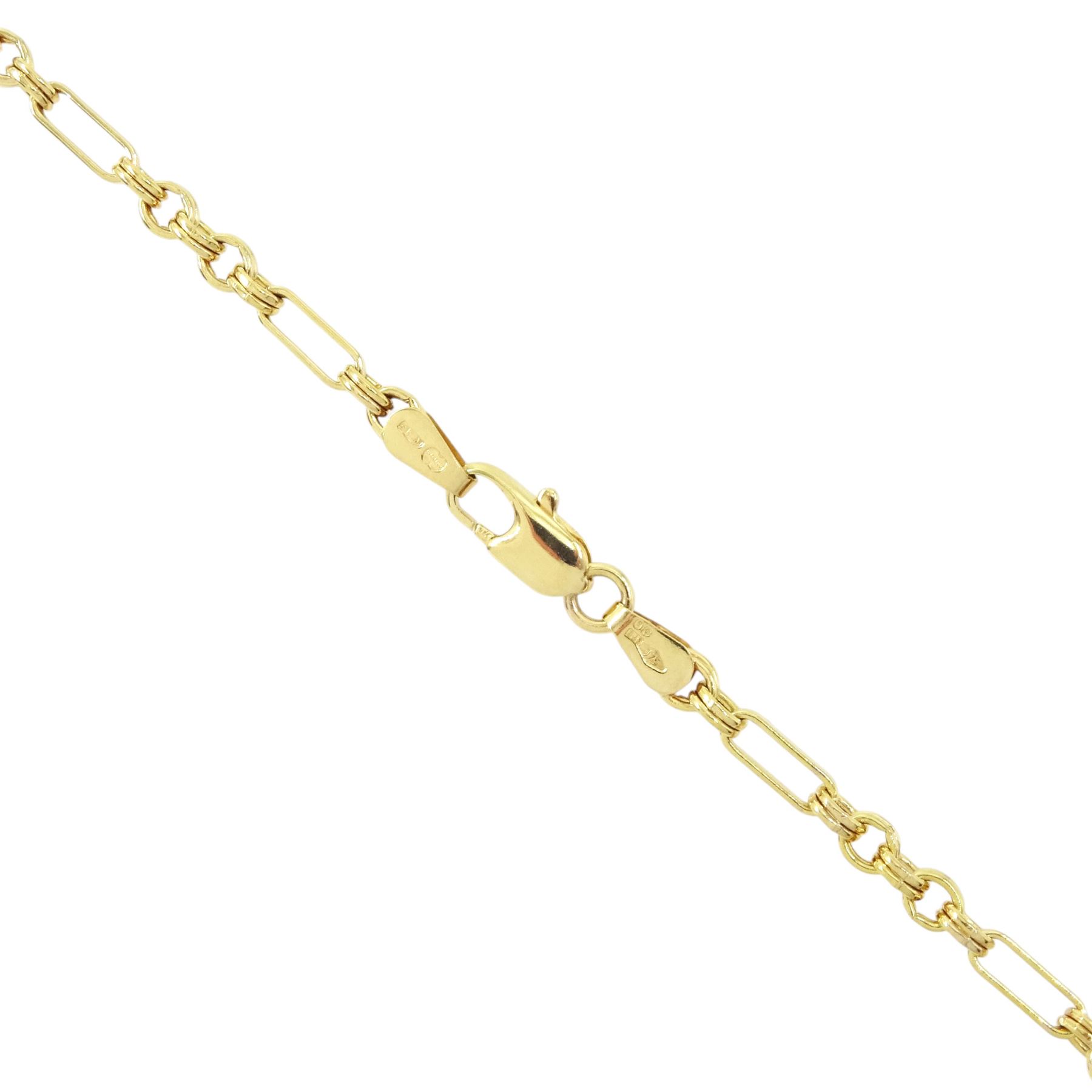 Gold oval locket with engraved decoration, on a gold fancy link chain, both 9ct, hallmarked 