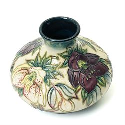 Moorcroft Hellebore pattern vase, of squat baluster form, with impressed and painted marks to base, in original box, H10.5cm 
