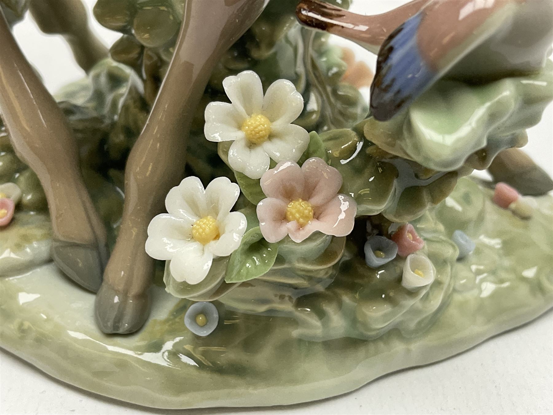 Two Lladro deer figures, comprising A Fawn and Friend no 5674 and Hi There no 5672, both with original boxes, largest example H14.5cm