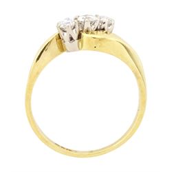 18ct gold diamond crossover ring, set three round brilliant cut diamonds, London 1991, total diamond weight 0.35 carat