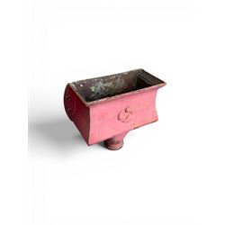 Edwardian heavy cast iron rainwater hopper, with water motif, painted in pale red finish