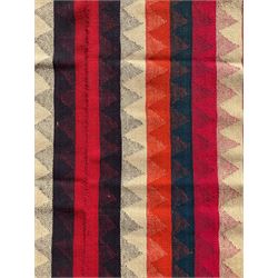 Southwest Persian Jajim Kilim ground rug, decorated with alternating vertical stripes in shades of crimson, orange, green, and black, with subtle triangular motifs woven into each stripe, bordered by narrow bands