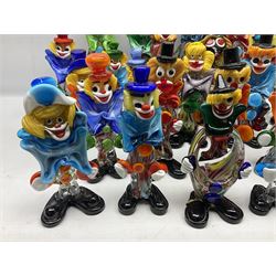 Large quantity of Murano glass clowns, to include larger examples, in two boxes