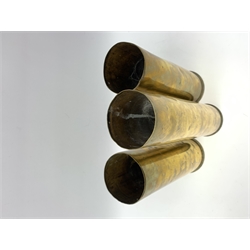 Three early 20th century plain brass shell cases, dated 1911, 1915 and 1916, tallest H35cm (3)