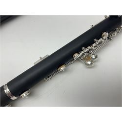 Modern three-piece oboe with full mechanism; in fitted hard case and outer carrying case