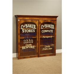  Victorian mahogany bookcase enclosed by two glazed doors with later 'Chas Baker' hand painted advertising writing, 132cm, H127cm, D30cm  
