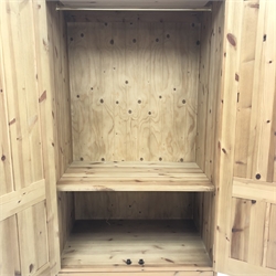  Solid Pine wardrobe, projecting cornice, two doors enclosing fitted interior above two drawers, plinth base, W91cm, H195cm, D59cm  