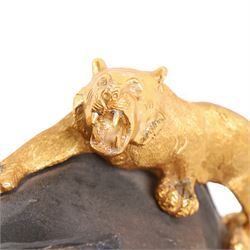 After Genryusai Seiya, modern bronzed model of an elephant being hunted by tigers, upon a black painted wooden base, height including base H45cm