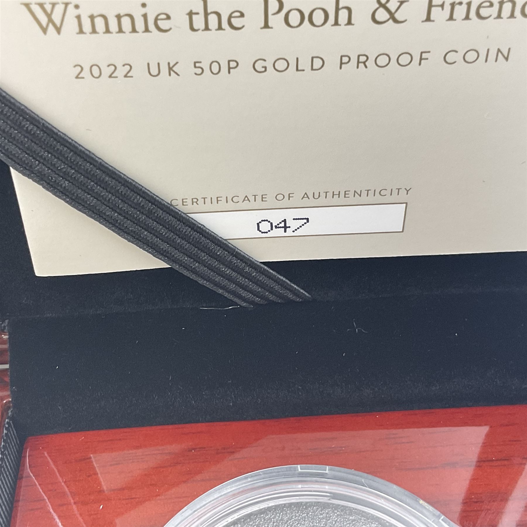 The Royal Mint United Kingdom 2022 'Winnie the Pooh and Friends' gold proof fifty pence coin, cased with certificate