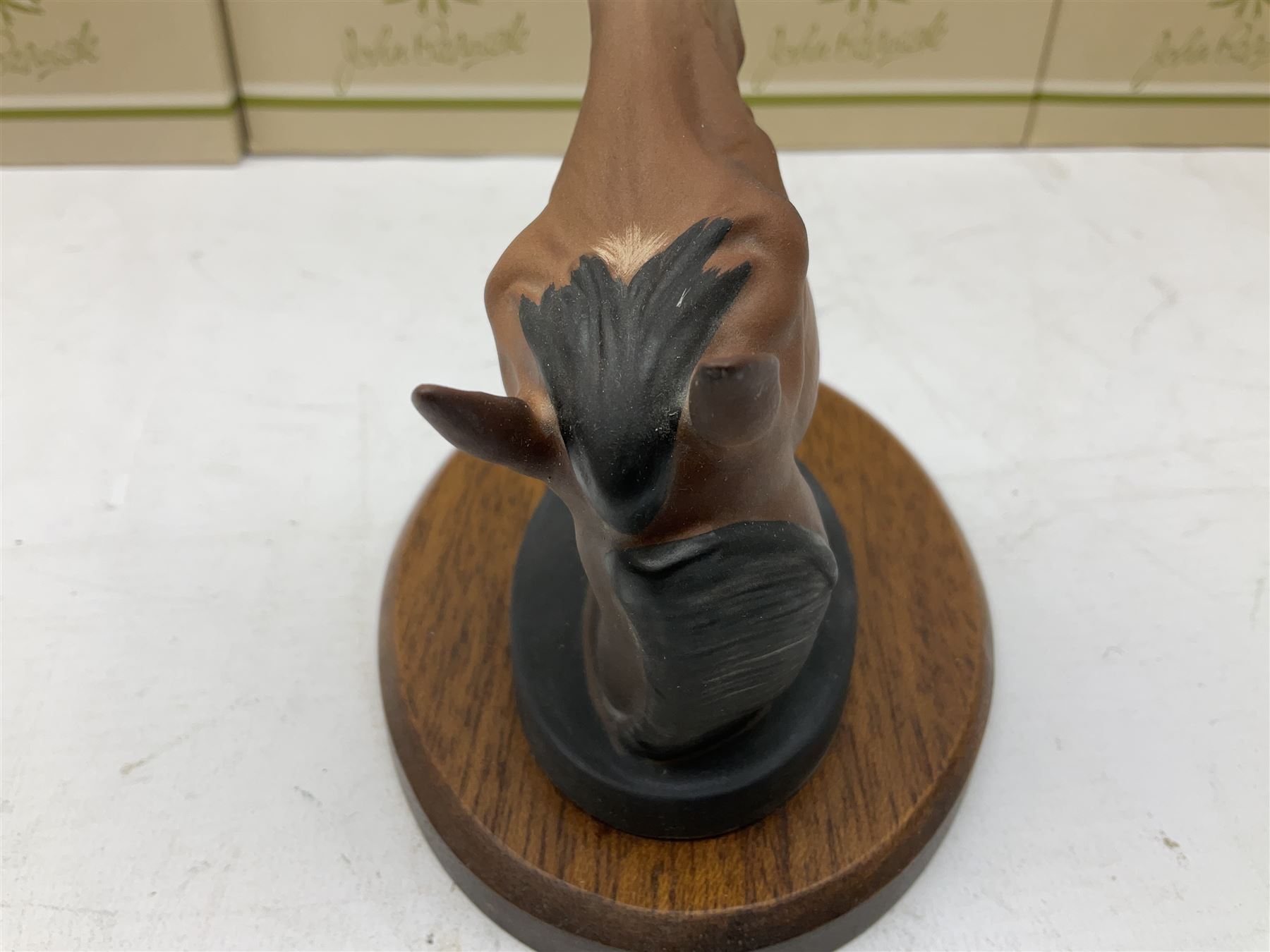 Beswick set of horse head wall plaques 'Champions all', comprising Arkle no.2700, The Minstrel no.2701, Red Rum no.2702, Troy no.2699, all with original boxes