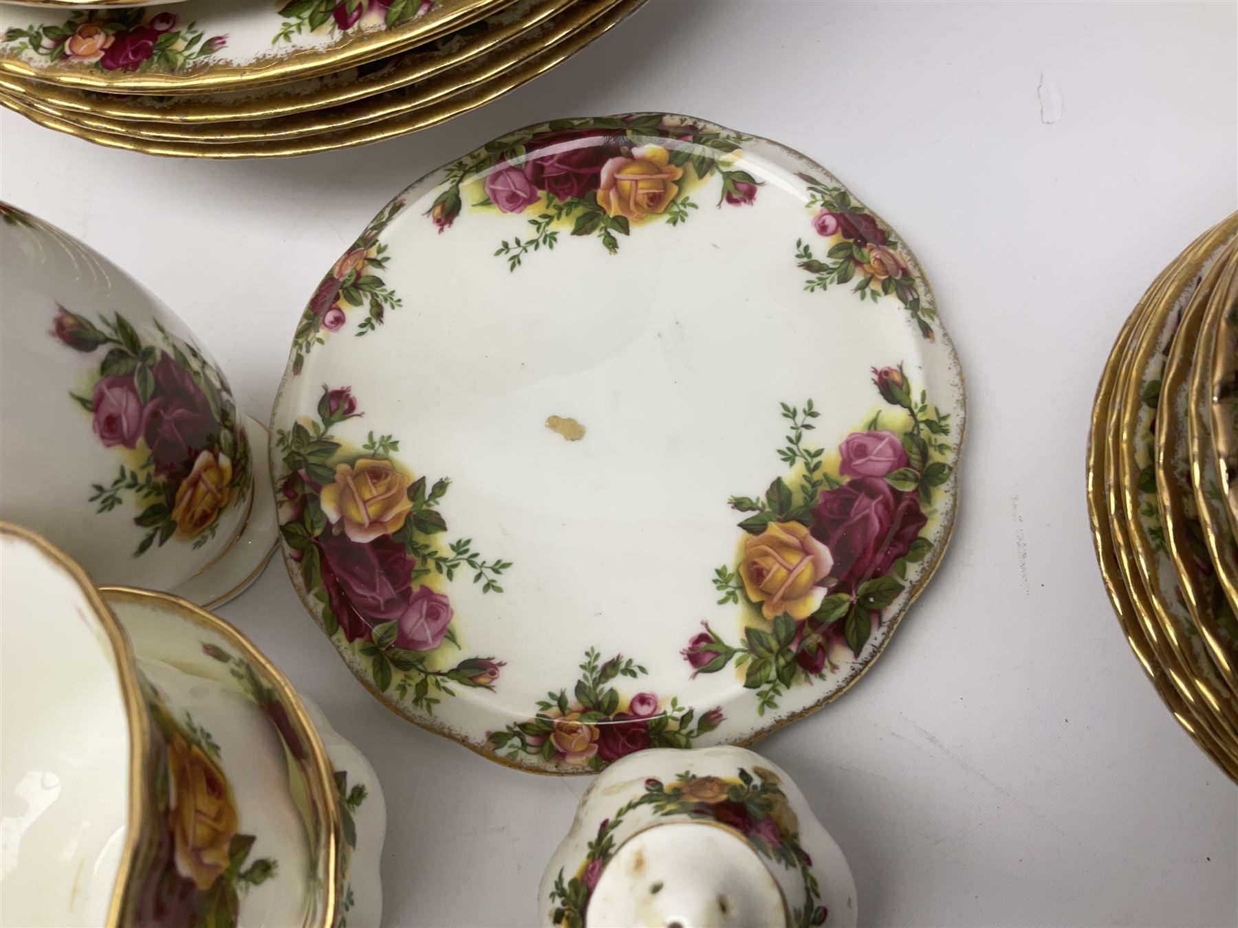 Royal Albert Old Country Roses pattern part tea and dinner service, including coffee pot, miniature teapot and stand, eight dinner plates, cake stand, sauce boat etc 