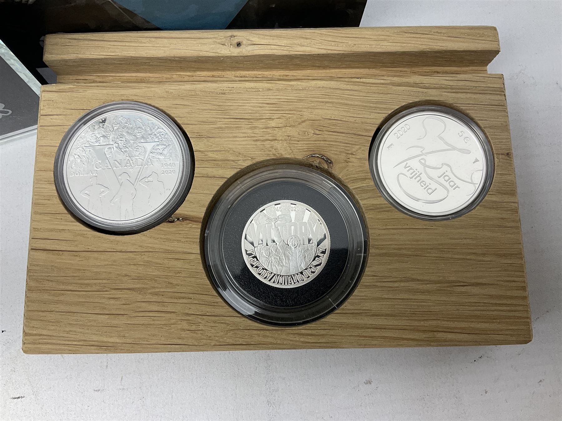 Royal Dutch Mint 'Europe Remembers' silver three coin set, comprised of Royal Canadian Mint 2020 one dollar '75th Anniversary of V-E Day', The Royal Mint 2020 one pound '75th Anniversary of VE Day' and Royal Dutch Mint 2020 five euros '75 Years of Freedom', cased with certificate
