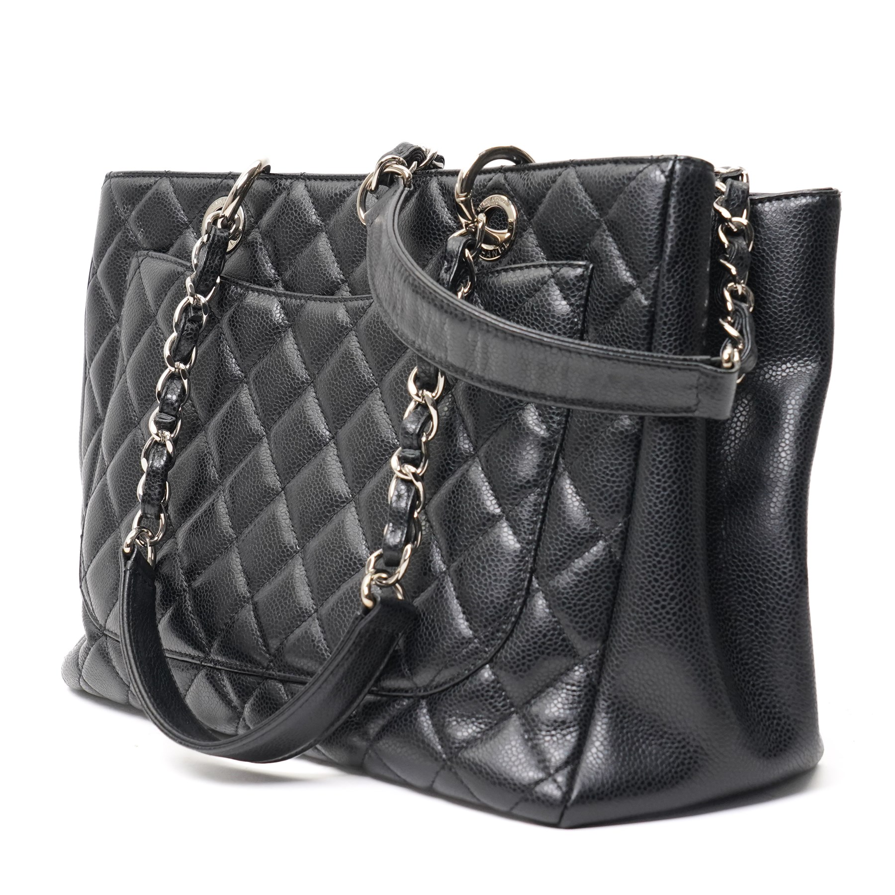 Chanel - black GST Grand Shopping Tote, caviar leather with classic diamond quilting and large embroidered CC logo to the centre front, with polished silver-tone hardware, a rear patch pocket, chain and leather handles, and an open top with three main interior compartments, 2009-2010, serial number 13547470