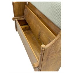 Early 20th century waxed pine pew, inset upholstered striped back panel with hinged box seat enclosing storage, shaped arms and turned supports