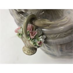 Lladro figure, Teresa, modelled as a lady in a crinoline dress with a basket of flowers, sculpted by José Puche, with original box, no 5411, year issued 1987, year retired 1989, H15cm