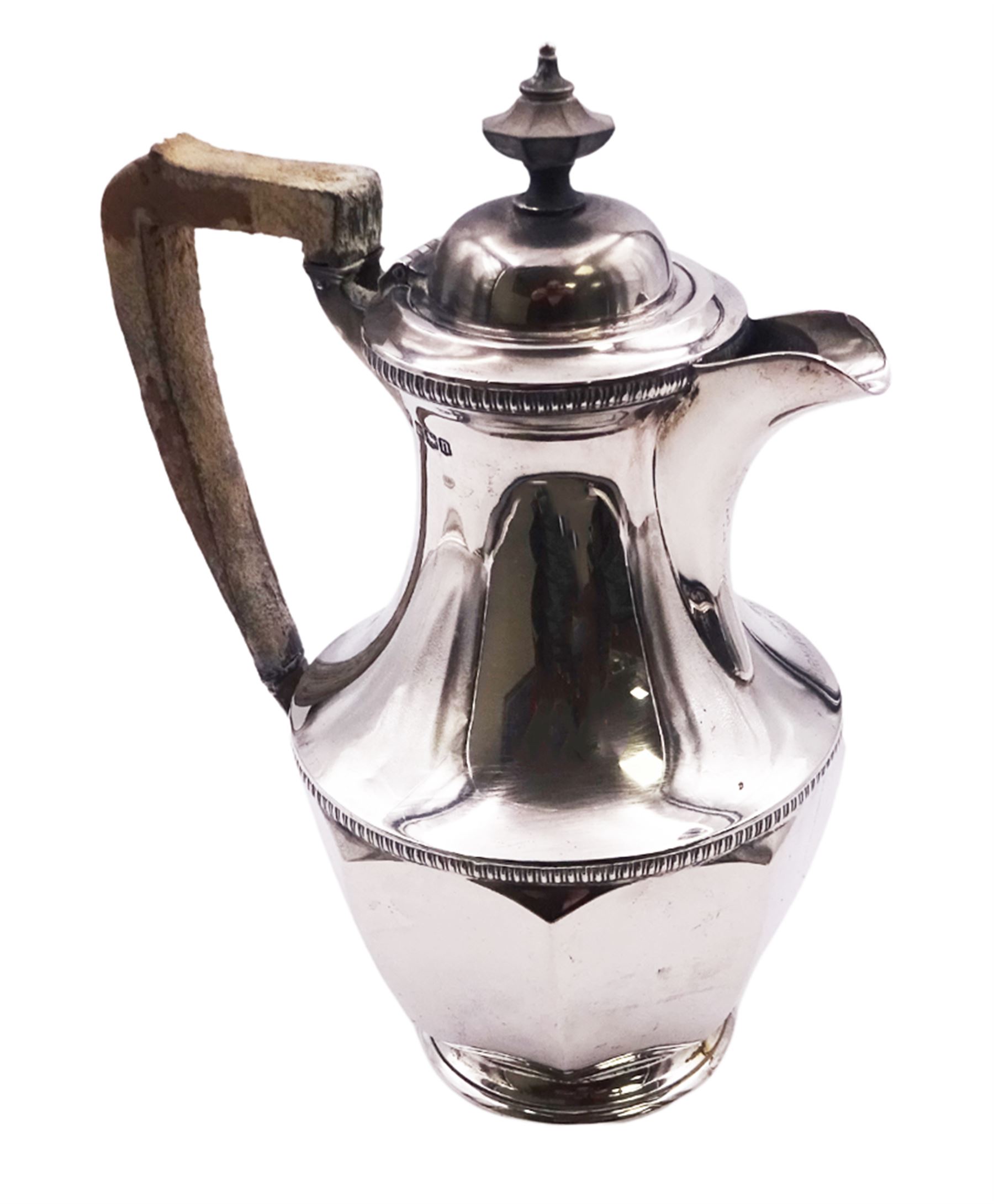 1930's silver hot water pot, of faceted baluster form with engraved dedication, and wooden handle and finial, hallmarked Harrison Brothers & Howson, Sheffield 1930, H20cm, approximate gross weight 15.66 ozt (487.2 grams)