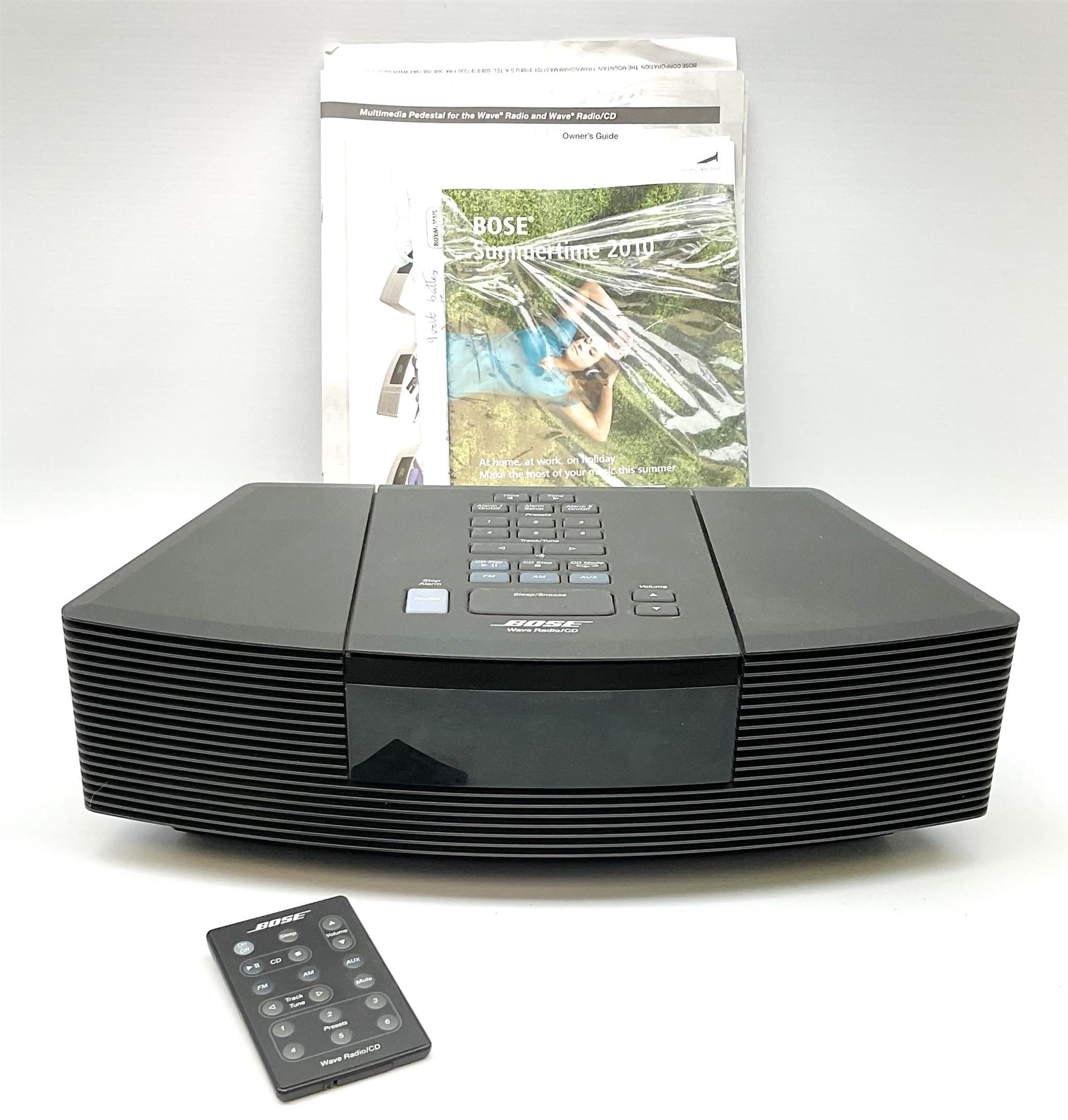 A Bose Wave radio and CD player, model no AWRC3G, with remote and instruction booklets 