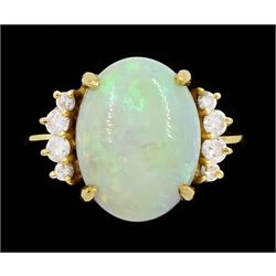 18ct gold single stone opal ring, with four round brilliant cut diamonds set either side, old opal ring, with four diamonds set either side