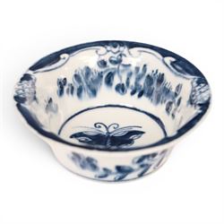 Lowestoft blue and white patty pan, circa 1765, the interior decorated with butterfly with...