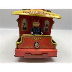 Chad Valley '0' gauge - clockwork tin-plate train set comprising LMS 0-4-0 tender locomotive No.3402 with two open wagons, loop of track and wooden signal; unboxed; and Japanese battery operated tin-plate Broadway Trolley bus No.10430