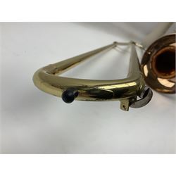 Sebastian Bucklet Aquae Sulis copper and brass trombone No.0910004; in lightweight carrying case; and Kinsman folding tubular chrome music stand in case (2)
