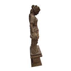 Hand carved stone Neoclassical figure of the Roman goddess Flora, her hair pinned with roses, draped in a toga, holding a basket of flowers in her right hand, raised on a stepped square plinth base 