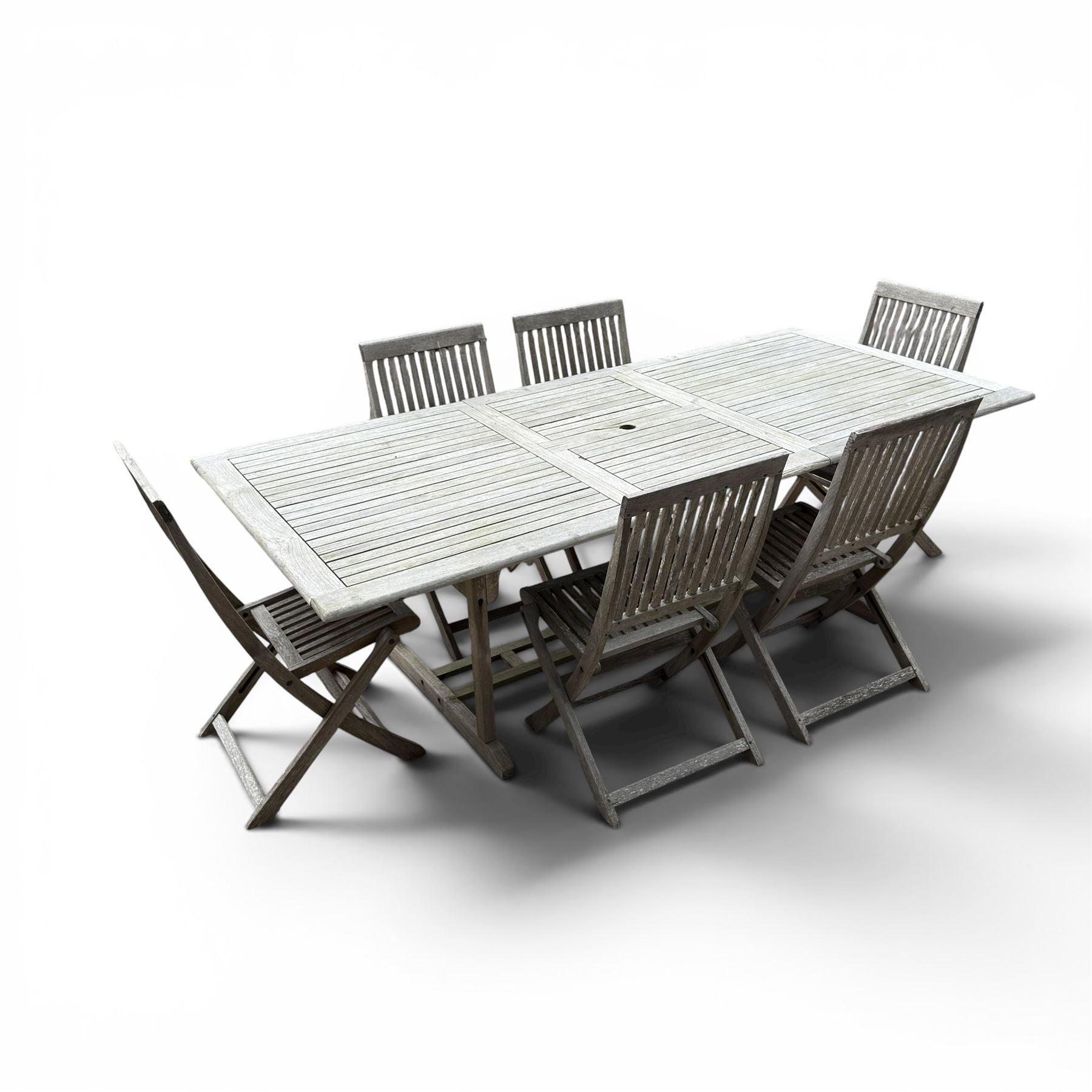 Teak garden table and 6 folding chairs in a grey finish